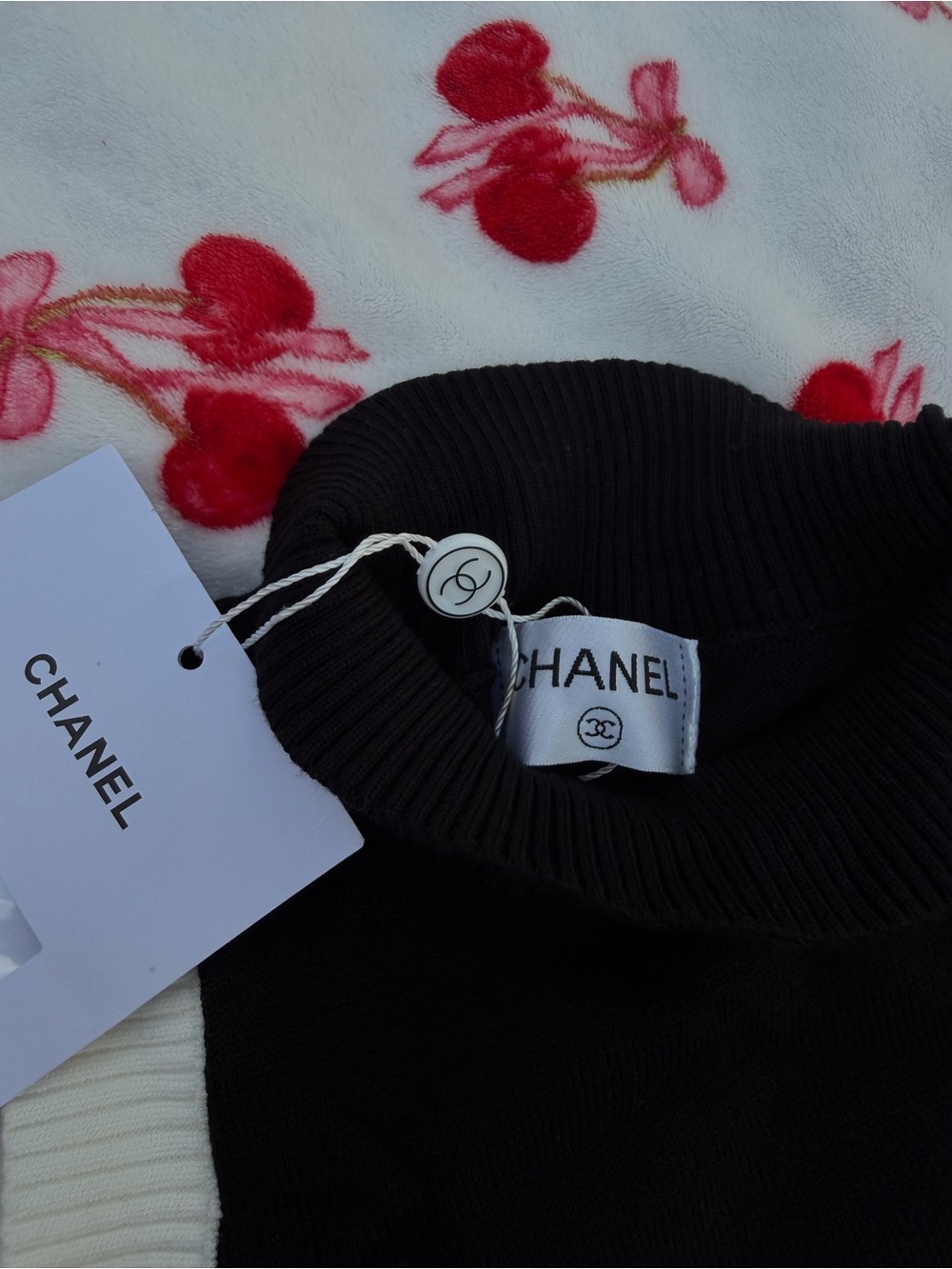 CHANEL Black Ribbed Turtleneck Hat Accessory